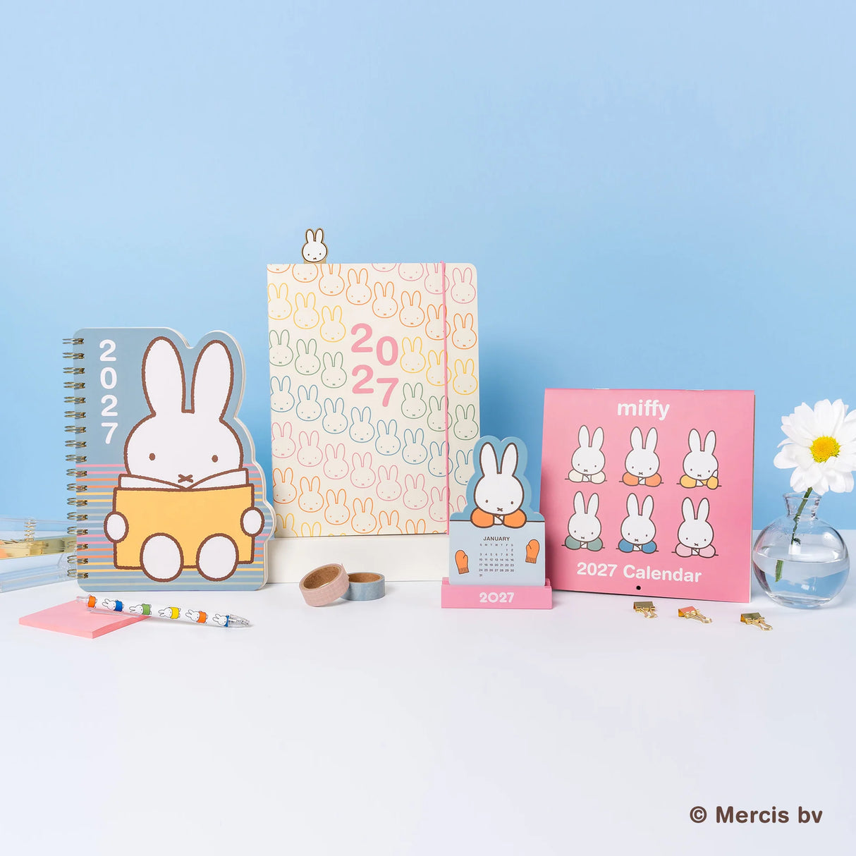 Plan the year with Miffy by your side! This slim 17-month planner (Aug. 2026–Dec. 2027) features monthly planning pages, full-color illustrations, tear-out shopping and to-do lists, and a handy interior pocket. A brass-and-enamel Miffy bookmark adds a charming touch while keeping your place with ease.
• 7.5"w × 9.75"h
• 17 months (Aug. 2026–Dec. 2027)
• 48 pages; 120 gsm acid-free FSC®-certified paper
• Softcover; Center-sewn binding
• Brass and enamel bookmark
• Elastic band closure
© Mercis bv