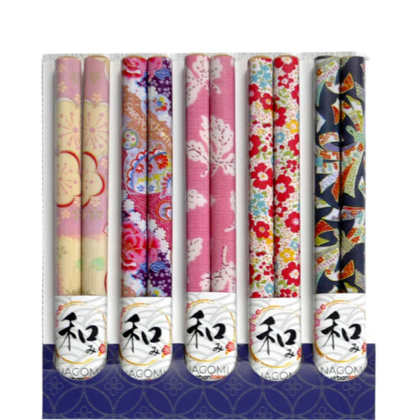 This set includes 5 sets of chopsticks with a red floral pattern inside a gift box.
Material: Bamboo
Size: 9"L
Origin: China