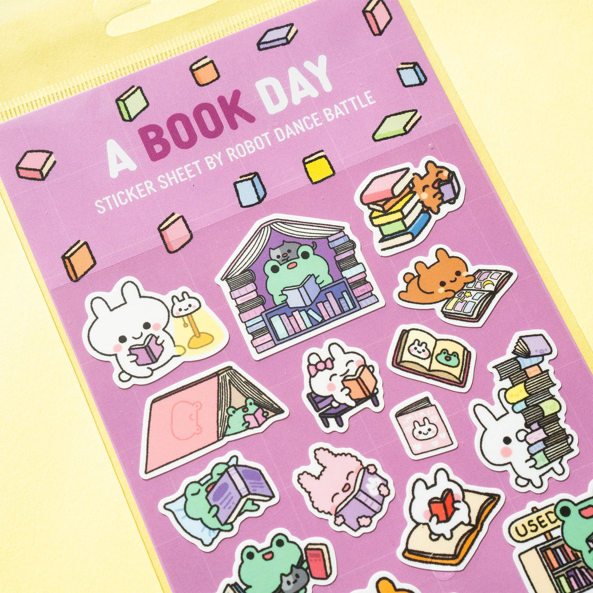 This is part of a new series of sticker sheets that feature different "days". There are 23 individual stickers on the sheet full of bizness success.
They are vinyl stickers on a clear plastic sheet with a backing card and packaging that's ready to display.
The whole packaging is 3.8 x 8.75" and is ready to hang. The sticker sheet is 3.75 x 5.8"