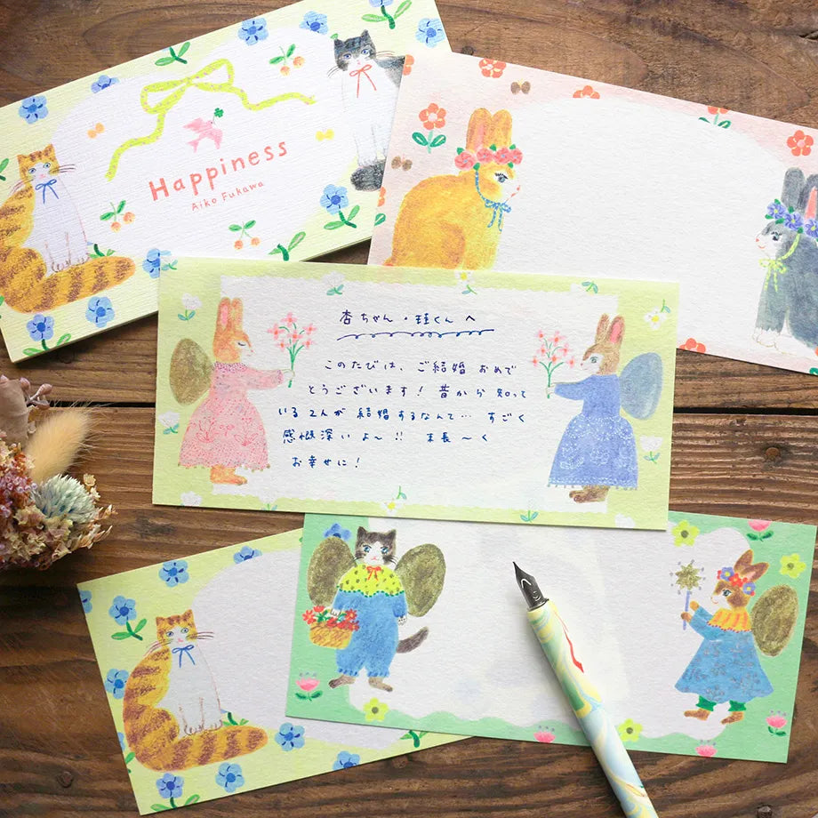 Illustration by Aiko Nukawa, featuring animals dressed in stylish clothes and cute flowers.
Since it uses fluorescent ink, the bright and vivid colors are adorable. Perfect for writing a small letter or thank-you note.
✨ Product Features
4 unique designs featuring whimsical animals and floral motifs
Perfect for short letters, thank‑you notes, or gift enclosures
Printed with fluorescent ink for vivid, eye‑catching color
Made with Mino washi, a traditional Japanese paper known for its soft texture and beaut