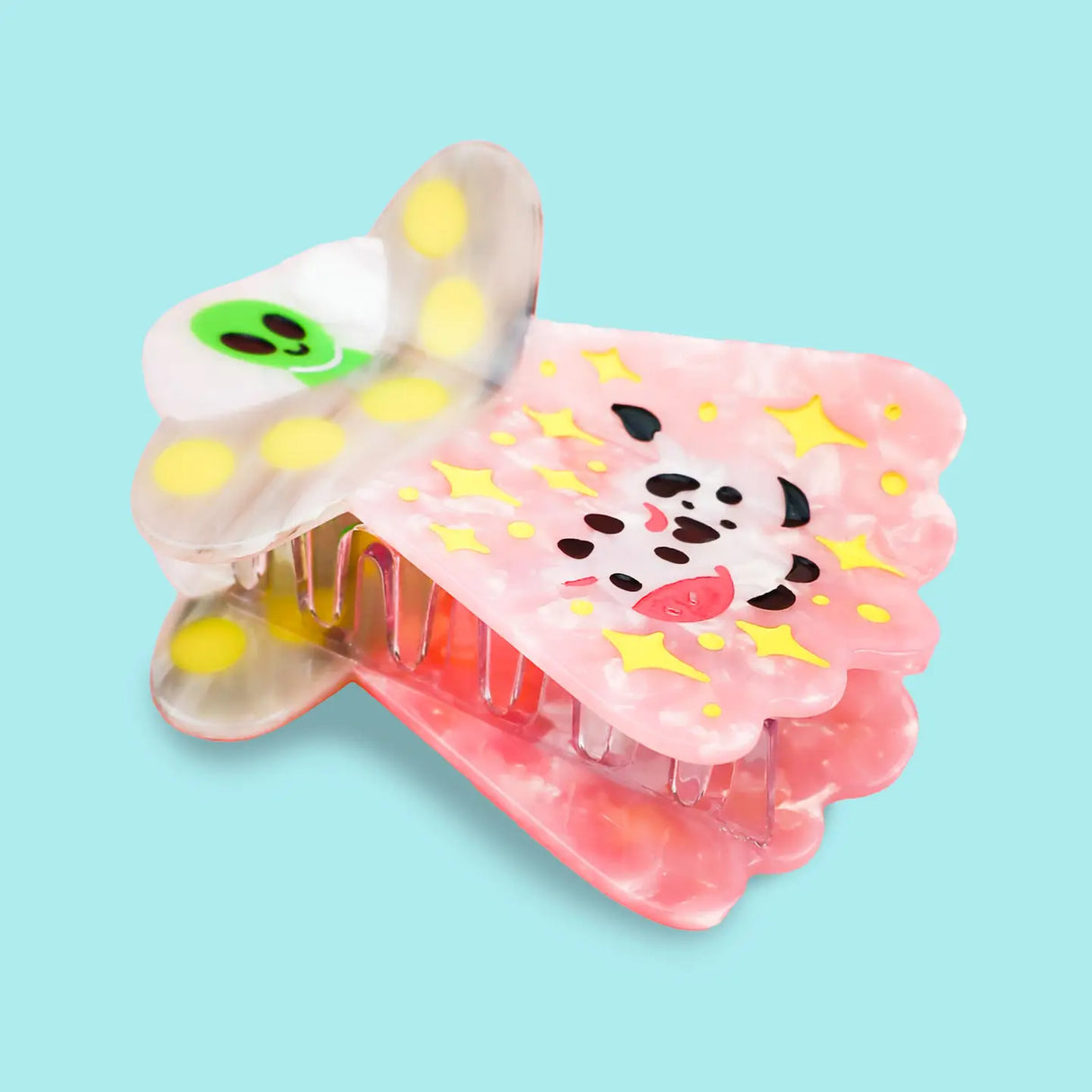 Alien UFO Hair Claw' Hair Accessory by Turtle's Soup.
Includes one (1) hair claw
Claw is roughly 3"
3D, engraved, printed, and painted details
High quality acetate material, stronger than standard hair clips
Themed packaging