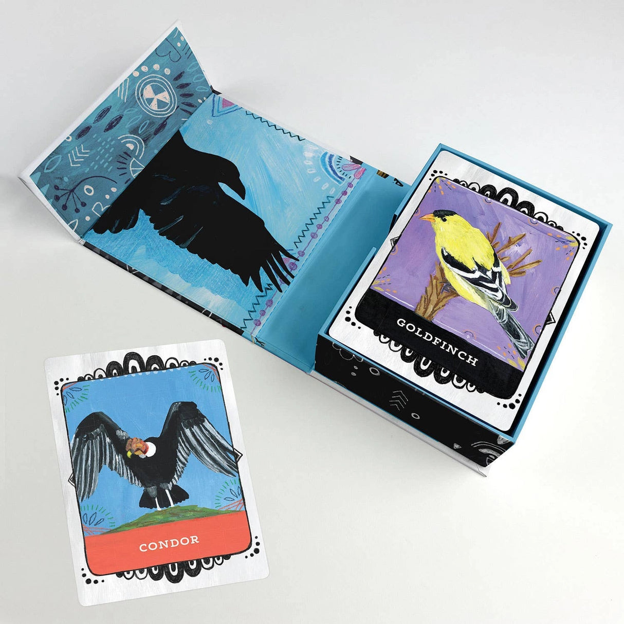 This beautiful oracle deck will help you spread your wings and fly into the wonderful world of birds + self-discovery.
Each card features a hand-painted bird portrait by artist Jessica Swift, and the guidebook is filled with messages and encouragement from 50 different birds that will guide you toward inner adventures and new emotional heights.
Animal deck illustrated by Jessica Swift
50 cards + 56-page guide book
4 x 5.5 x 1.5 inch box with magnetic closure