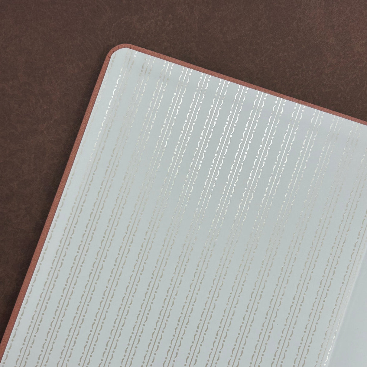 Archer and Olive A5 Notebook - Texas Forever
A charming pink journal featuring a Texas bluebonnet forever stamp on the cover — a sweet nod to the Lone Star State and a perfect keepsake for writers, travelers, and stationery lovers.
✨ Features You’ll Love
Ultra-thick paper designed to prevent ghosting and bleeding
Elastic closure to keep pages secure
Built-in pen loop for your favorite pen or pencil
📓 Notebook Details
Size: A5
Pages: 118 pages
Paper: 160gsm ultra-thick, bleed-resist