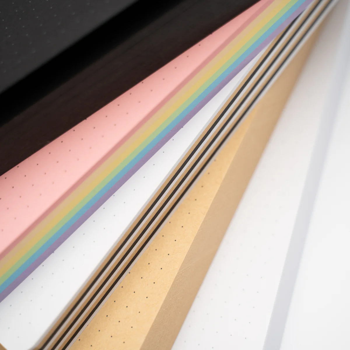 Getting to the end of your notepad? Our notepads are designed to be refillable, meaning you can pick up your favorite Notepad Refill without needing to purchase a whole new set. Crafted with our signature thick dot-grid paper, our notepads are perfect for journaling, planning, note-taking, and creative projects.
Available Colors:
White – the classic pick for everyday use
Black – bold and dramatic for creative contrast
Kraft – natural tones for a rustic feel
Pastel –