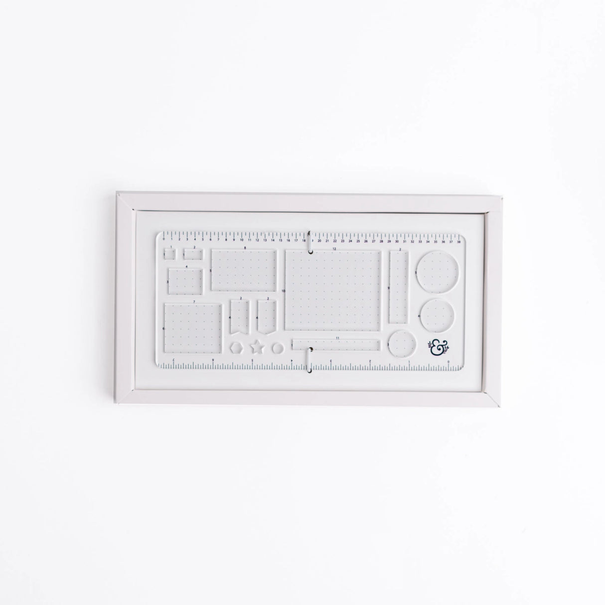 Get precise and achieve perfect outlines in your journal with our A5 Dot Grid Planning Stencil. This handy grid spacing guide helps you measure out your bullet journal spreads with ease. Simply pick a layout and use the dot grid journal ruler to mark out each box.
The stencil features half square notches, guide boxes, helpful shapes, and more so you can quickly create an entire journaling spread without the worry of counting dots or having uneven lines!
This stencil is particularly helpful for A5 notebook