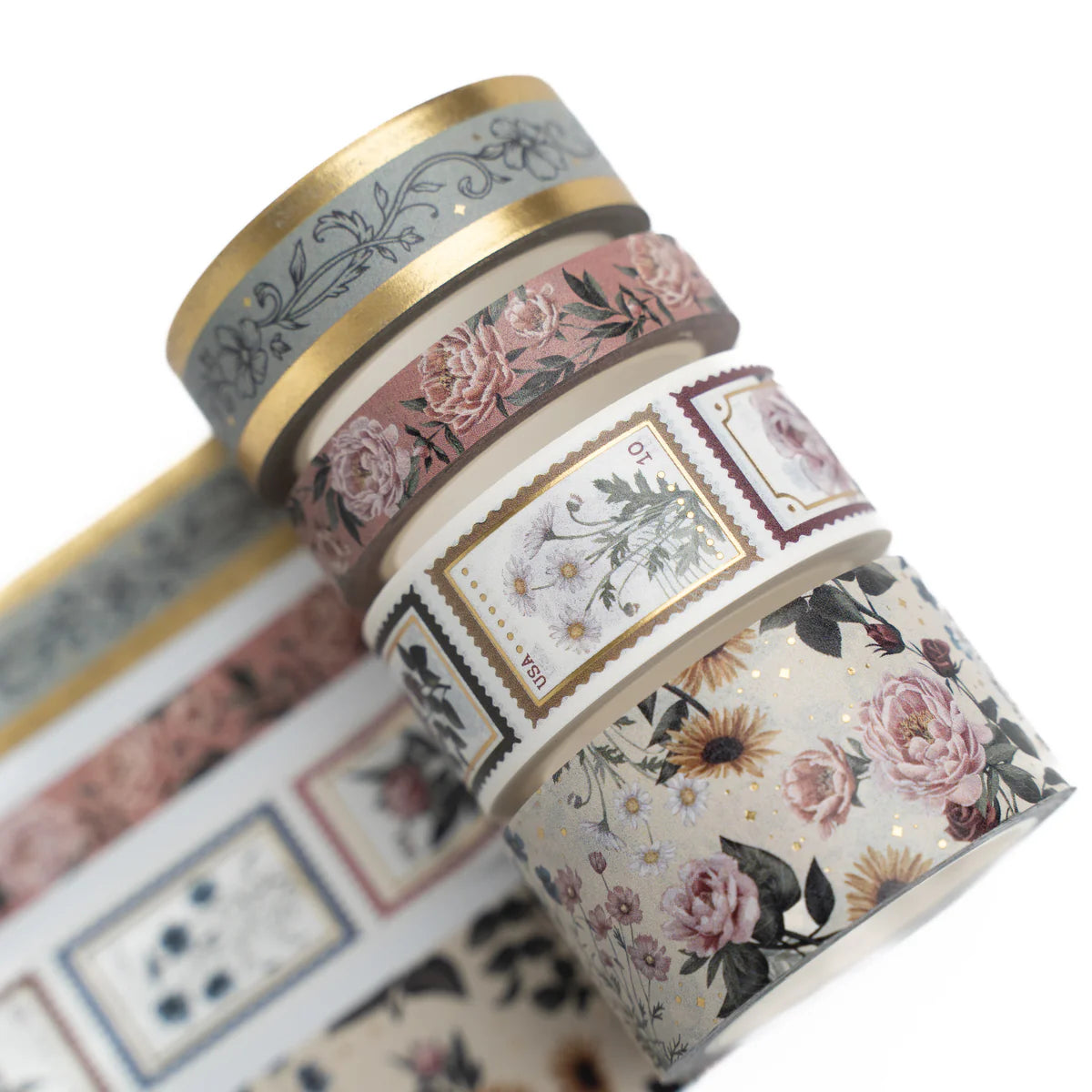Appreciate intricate vintage designs with our Antique Floral Washi Tape. This set of 4 Washi Tapes is inspired by classic florals with a vintage twist. It includes three rolls of rose and sunflower designs with one roll of a decorative stamp design, in various sizes with a rustic color palette.
Washi Tape is the perfect stationery supply to use for journaling, gift wrapping, crafting or any decorative purposes you wish to enhance with an enchanting rustic elegance.
So if you
