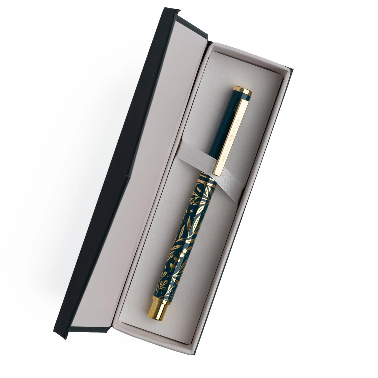 A beautifully designed craft knife featuring a deep teal barrel adorned with gold botanical detailing. With its precision blade and sturdy metal construction, this tool brings both function and elegance to journaling, scrapbooking, and detailed paper crafting.
Specs & Details:
Material: Metal body with gold accents
Design Theme: Teal barrel with gold botanical illustration
Blade: Precision craft blade (replaceable)
Features: Removable cap for safe storage, textured grip for control
Use: Ideal for cutt