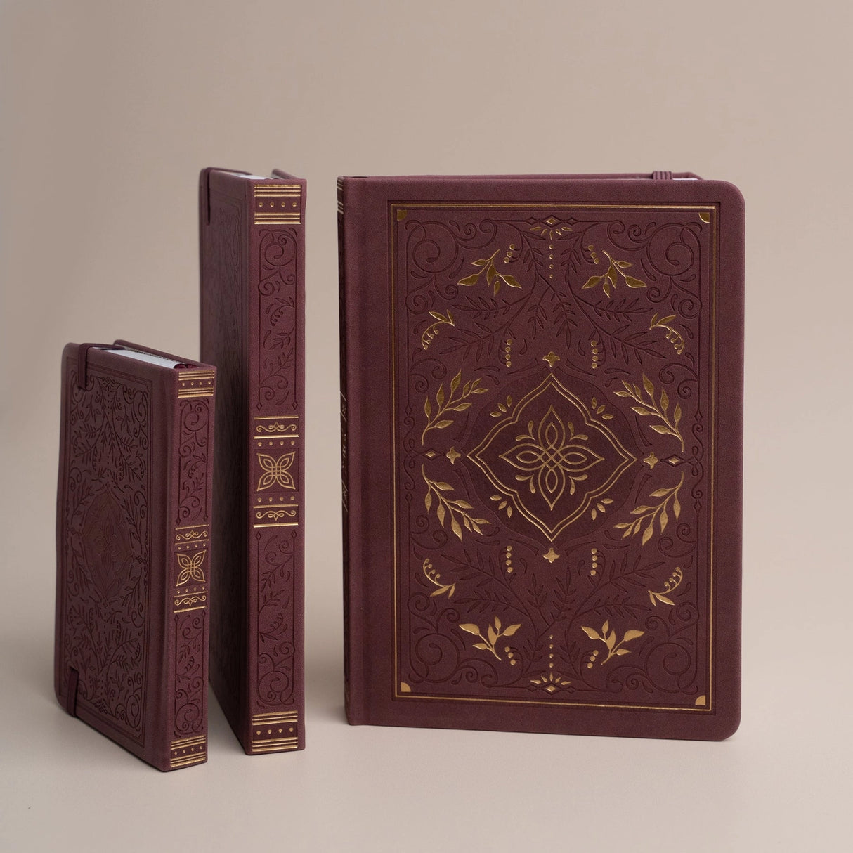 Step into a world of quiet enchantment. The Storybook Notebook in Plum pairs rich jewel tones with ornate gold detailing, creating a journal that feels like a treasured vintage tale come to life. Whether you're capturing daily reflections, writing new ideas, or planning your next great adventure, every page feels like stepping into your own story.