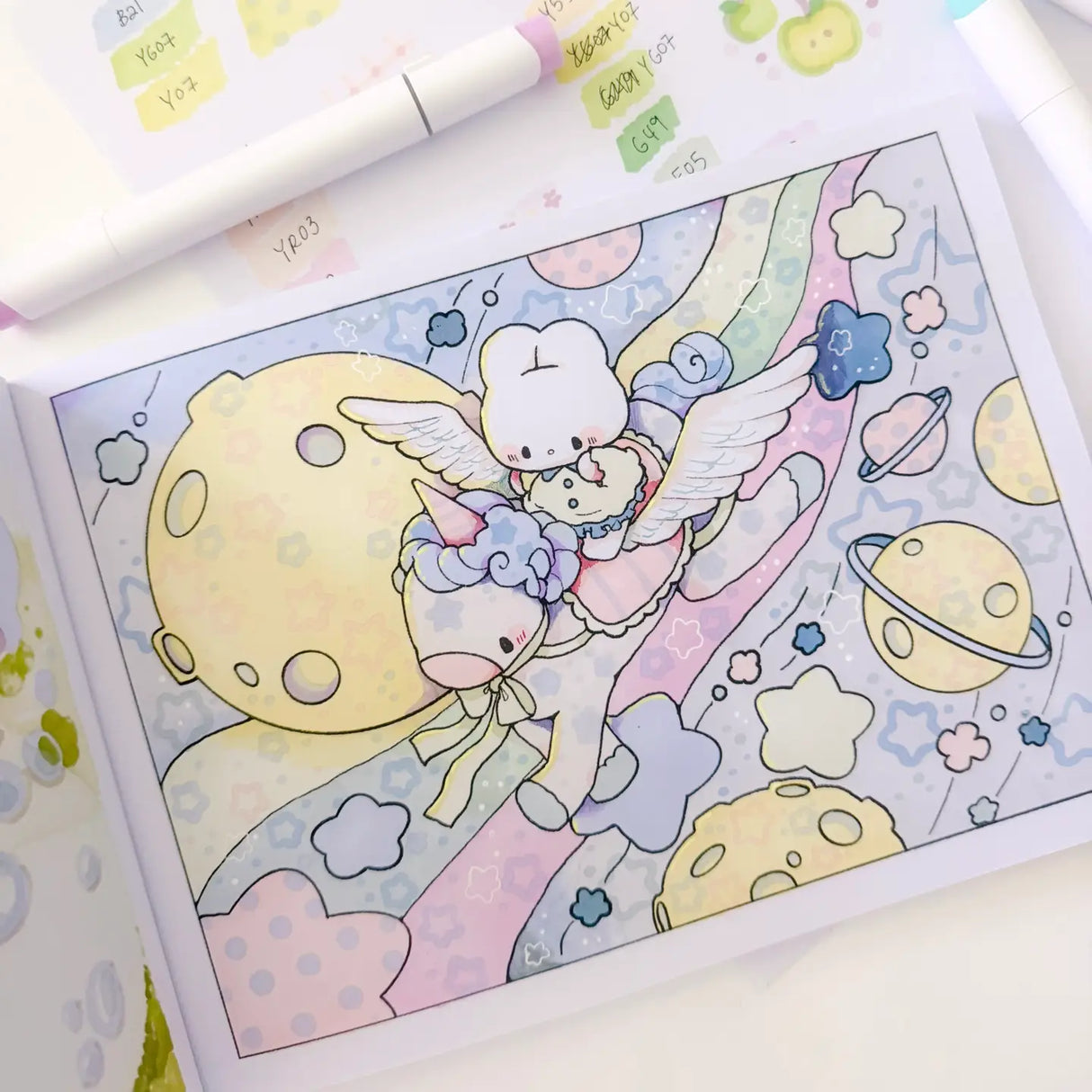 🍓🐞 Drift into a World of Dreamy Days with Coloring Book Vol. 3! 🧵✨
Step into a playful little world stitched together with lucky ladybugs, vintage buttons, gingham bows, and cozy daydreams. Featuring 25 original, full-page illustrations, Dreamy Days Vol. 3 follows Cotton and Pluto through charming kitchens, clover-filled gardens, strawberry picnics, and delightfully kitschy corners overflowing with nostalgic treasures and cheerful details.
Inspired by retro trinkets, handmade keepsakes, and soft countr