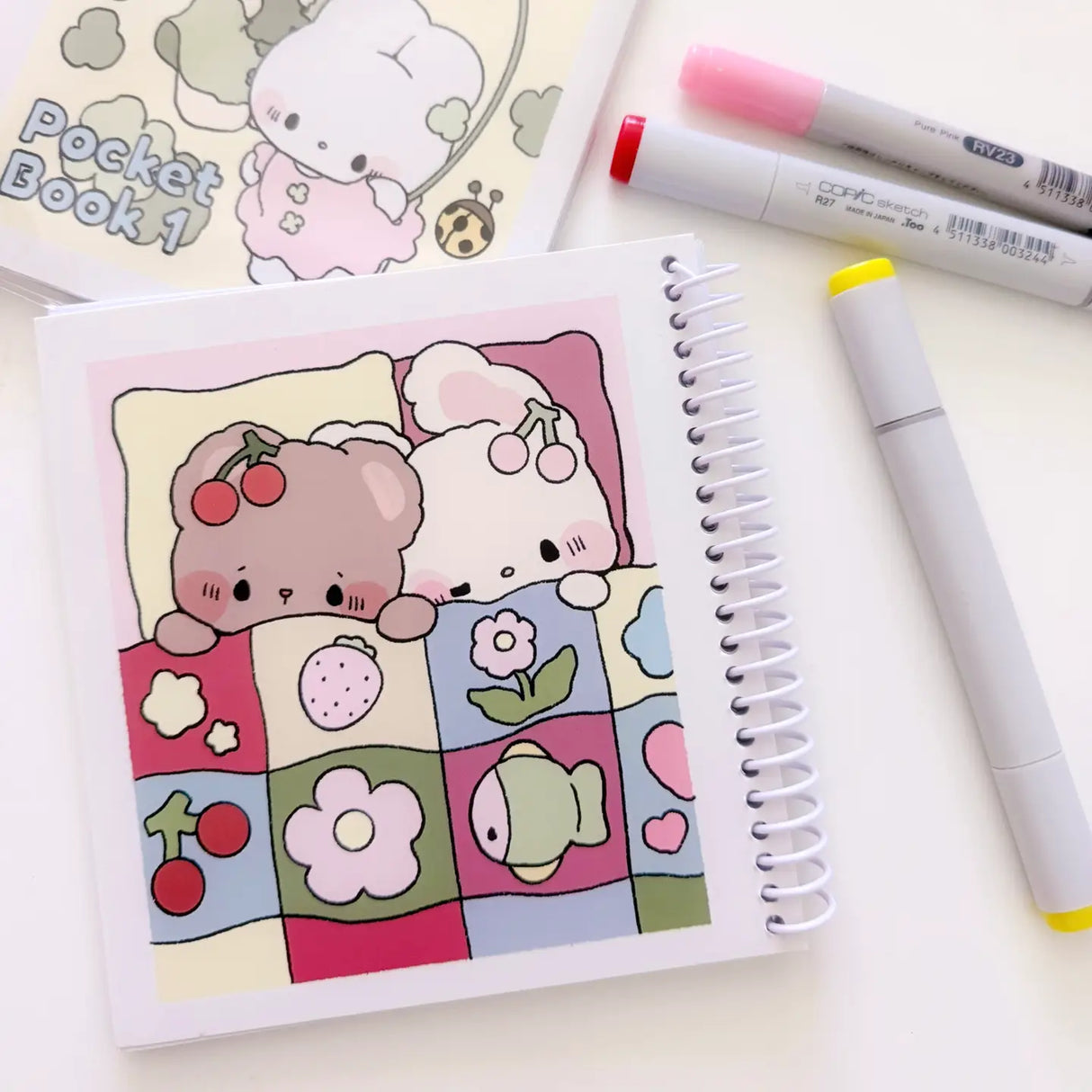 Cozy Creativity Anywhere with the Atelier by Jo Pocket Coloring Book! ✨
Bring Cotton and Pluto along on your everyday adventures with this adorable Pocket Coloring Book featuring simple and cozy Atelier by Jo character pages! Filled with 20 original illustrations in a compact 4 x 5 inch format, this spiral-bound mini coloring book is designed for relaxing, stress-free coloring anytime and anywhere.
Featuring sweet character moments, cute everyday scenes, and easy-to-color designs, this collection is perfe