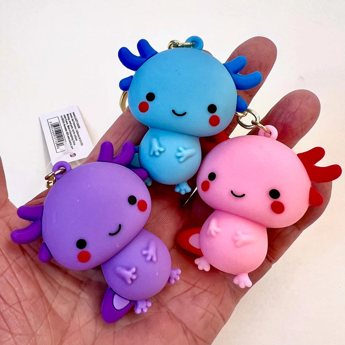 This adorable keychain adds personality wherever you go, whether clipped to your keys, bag, or backpack. Cute, lightweight, and easy to gift, it’s perfect for anyone who loves whimsical accessories or axolotl-themed goodies.