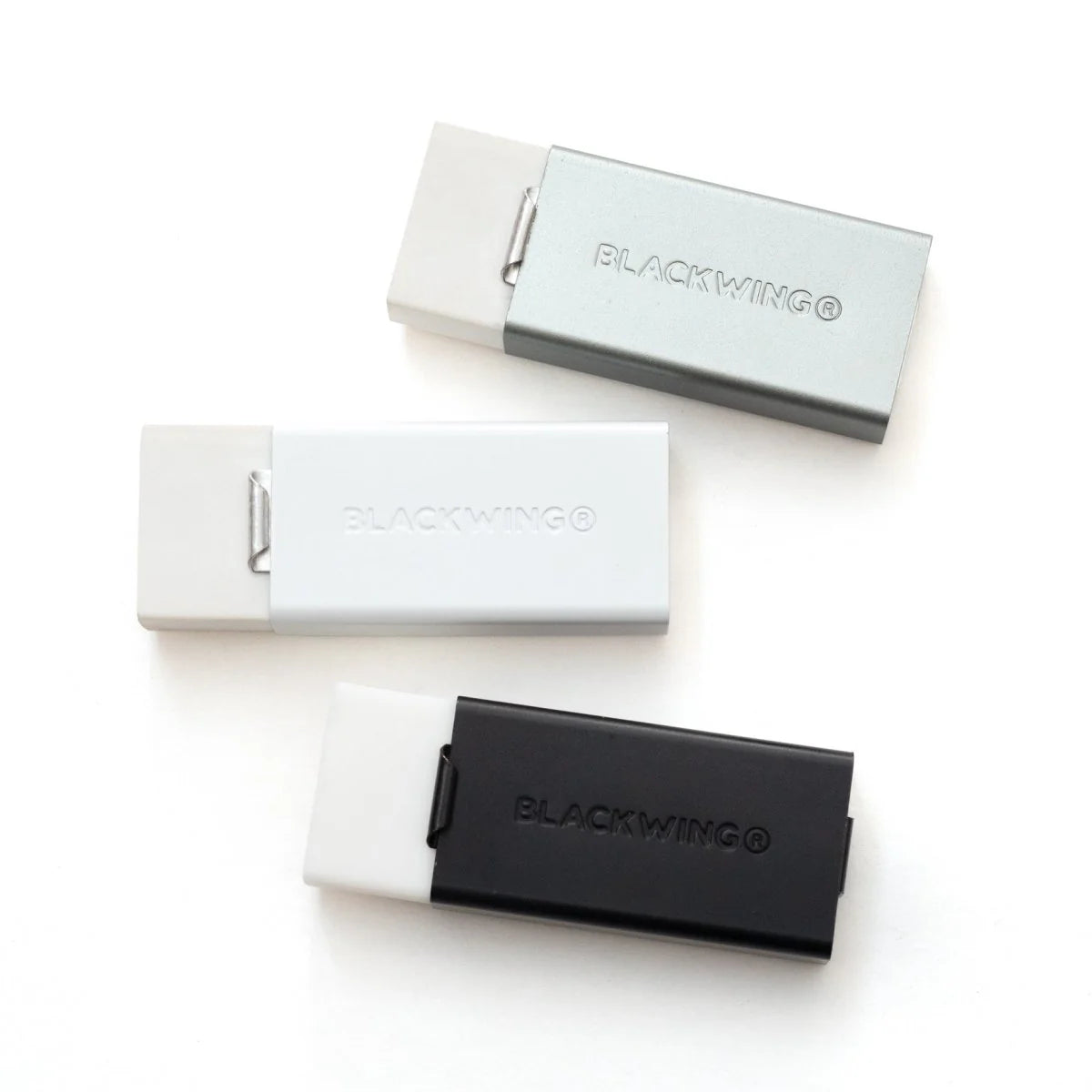 We took the iconic design of our eraser clip and adapted it into a sleek handheld form that feels great to use.
The eraser is made of a special soft material that erases the dark lines of our graphite cleanly and easily. The holder is made of durable aluminum that lets you get a solid grip while erasing. It also includes a jumbo-sized version of the iconic Blackwing clip, so you can extend the eraser as you use it.