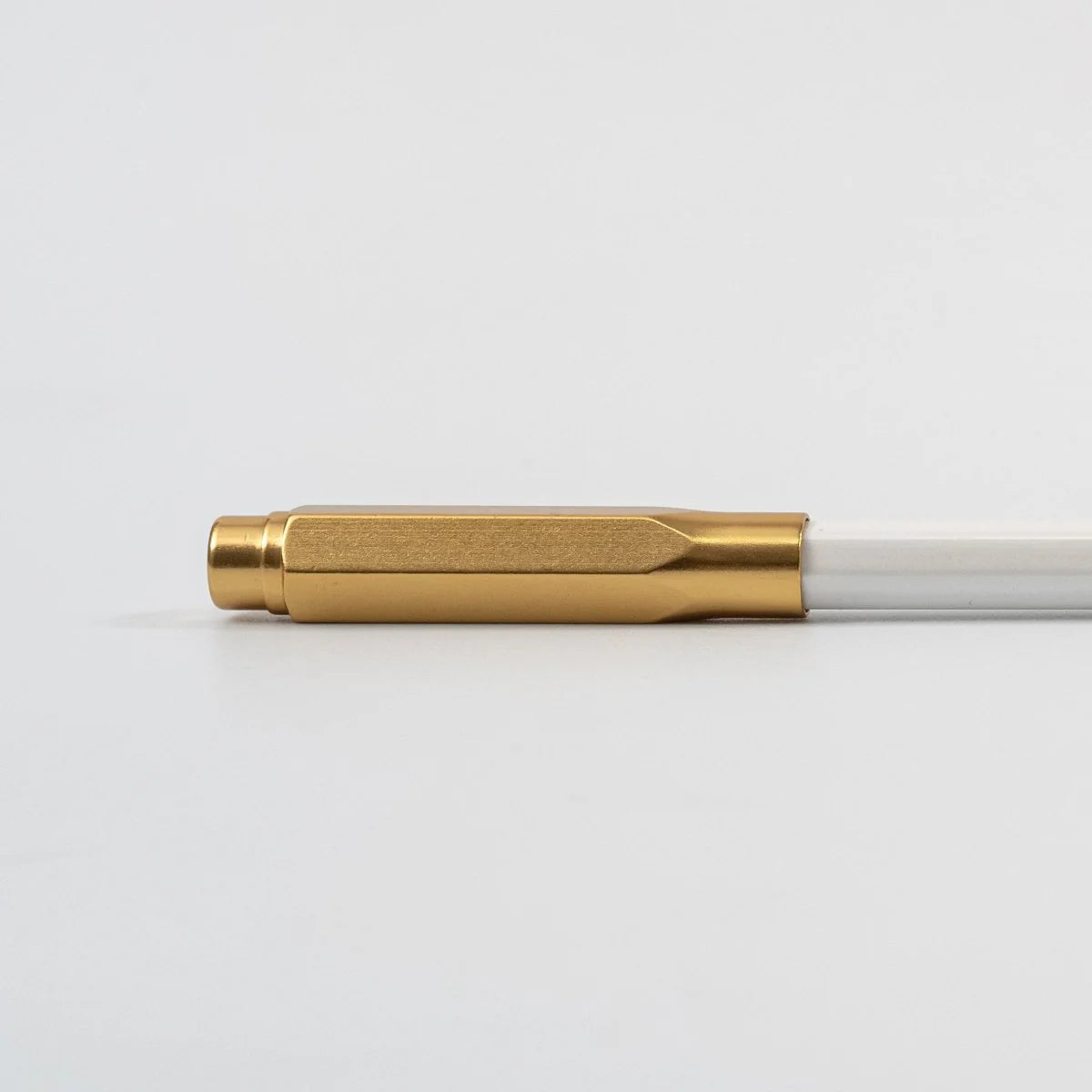 The Blackwing Point Guard is designed to ensure your Blackwing pencil gets wherever you’re going in one piece. Crafted out of lightweight, machined aluminum, the Point Guard goes over the point of your Blackwing pencil, keeping it safe in your bag, pocket, or pencil roll. The tip of your pencil “floats” inside the cap to protect your point against unexpected drops or jams.
Point Guards are available in matte black, matte white, bright gold, bright silver, or a mixed set of 3 (gold, silver, and black).