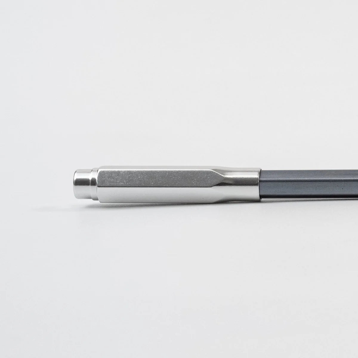 The Blackwing Point Guard is designed to ensure your Blackwing pencil gets wherever you’re going in one piece. Crafted out of lightweight, machined aluminum, the Point Guard goes over the point of your Blackwing pencil, keeping it safe in your bag, pocket, or pencil roll. The tip of your pencil “floats” inside the cap to protect your point against unexpected drops or jams.
Point Guards are available in matte black, matte white, bright gold, bright silver, or a mixed set of 3 (gold, silver, and black).