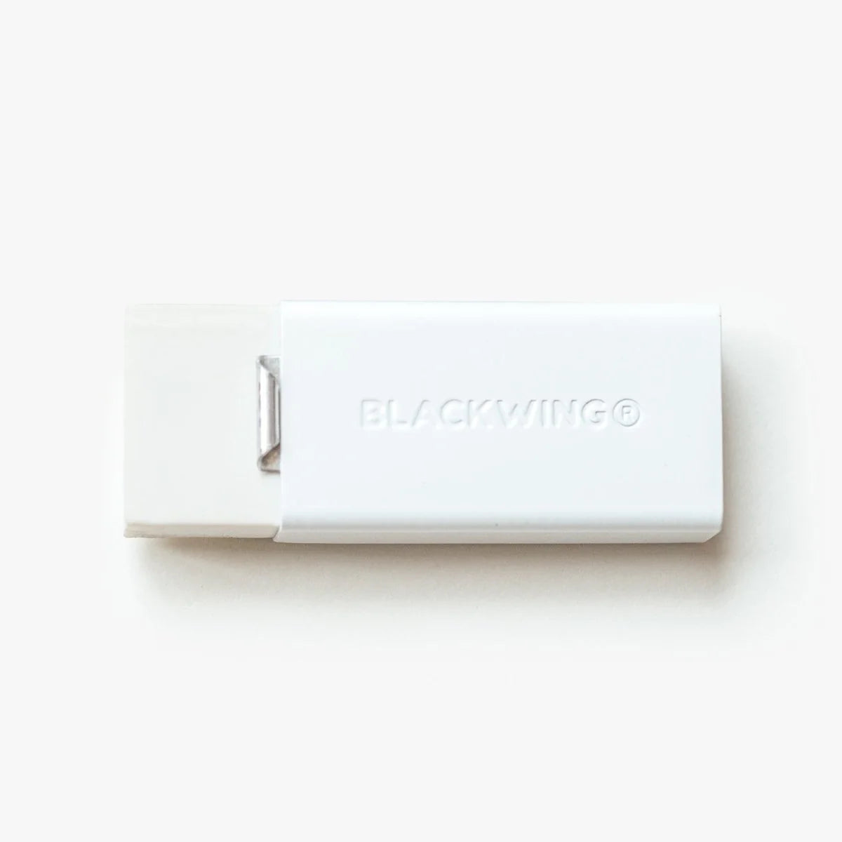 We took the iconic design of our eraser clip and adapted it into a sleek handheld form that feels great to use.
The eraser is made of a special soft material that erases the dark lines of our graphite cleanly and easily. The holder is made of durable aluminum that lets you get a solid grip while erasing. It also includes a jumbo-sized version of the iconic Blackwing clip, so you can extend the eraser as you use it.