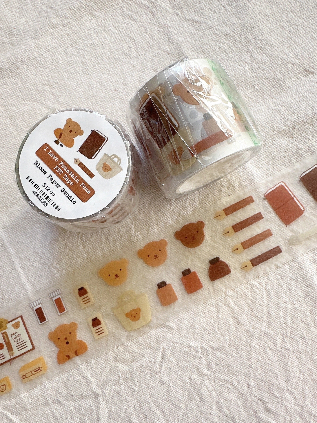 Bear loves attending journaling events with friends. He likes sharing his spreads, stickers, and fountain pens!
Made with:
- clear matte PET Tape
- kiss cut designs
- 40mm x 5m
Note: Colors on screen may appear slightly different on paper. By purchasing, you have acknowledged reading this disclaimer.