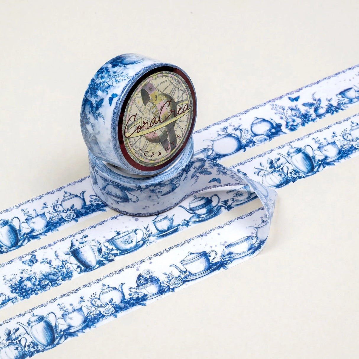 A unique vintage style washi tape featuring some dreamy tea party inspired blue patterns on a white background. Size: 2cm x 10m