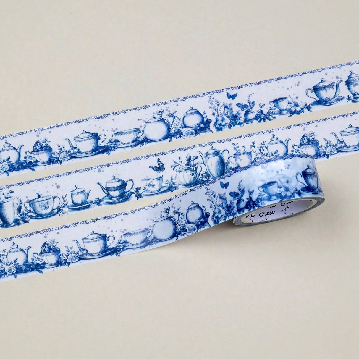 A unique vintage style washi tape featuring some dreamy tea party inspired blue patterns on a white background. Size: 2cm x 10m