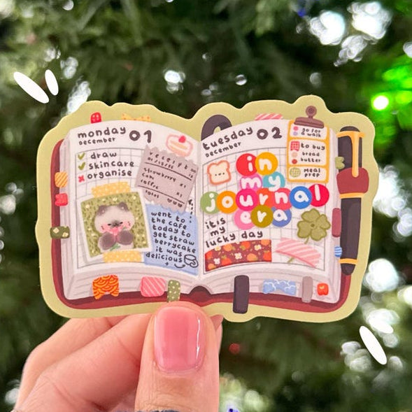 This cozy matte laminated waterproof journal spread sticker is perfect for planners, scrapbooks, laptops, calendars, bullet journals and more! Designed with a warm, kawaii aesthetic, it features a cute daily diary layout, doodles, checklists, and colorful decorative elements that bring joy to any stationery setup.
♡ STICKER DETAILS ♡
~ Sticker size: 2.5’’ inches
~ Printed on matte sticker paper
~ Matte Laminate finish ✨
~ ONLY Handwash. This sticker is not dishwasher or microwave safe.