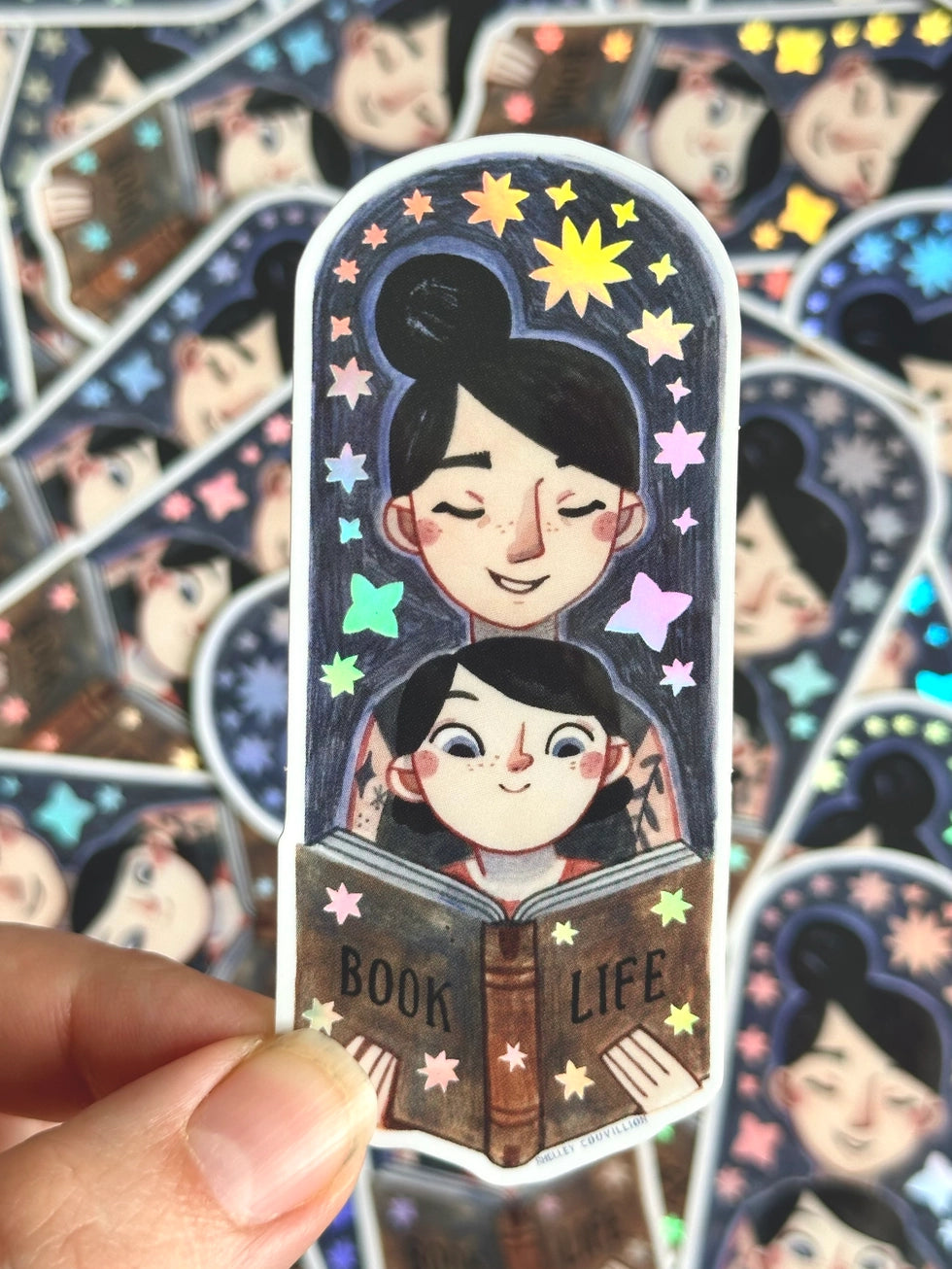 Bring the magic of storytime to life with our enchanting Mom and Kid Reading Sticker! Crafted with love and attention to detail, this holographic vinyl sticker captures a heartwarming scene of a mom and child engrossed in a book together that your customers will love!
Features: Size: 3.5 inches tall, 1.5 inches wide
Material: Premium vinyl with a captivating holographic finish