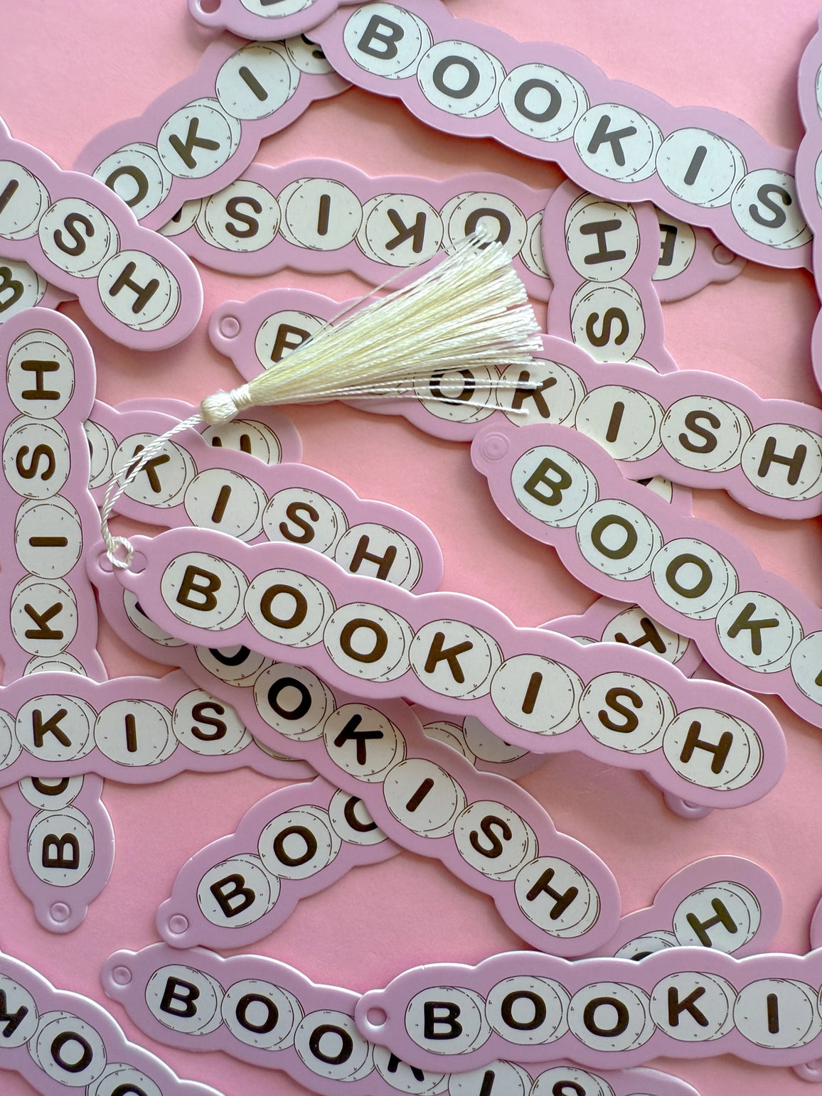 Made out of a heavy duty cardstock. Also double sided. Comes with an off white tassel.
Dimensions: 6inches long