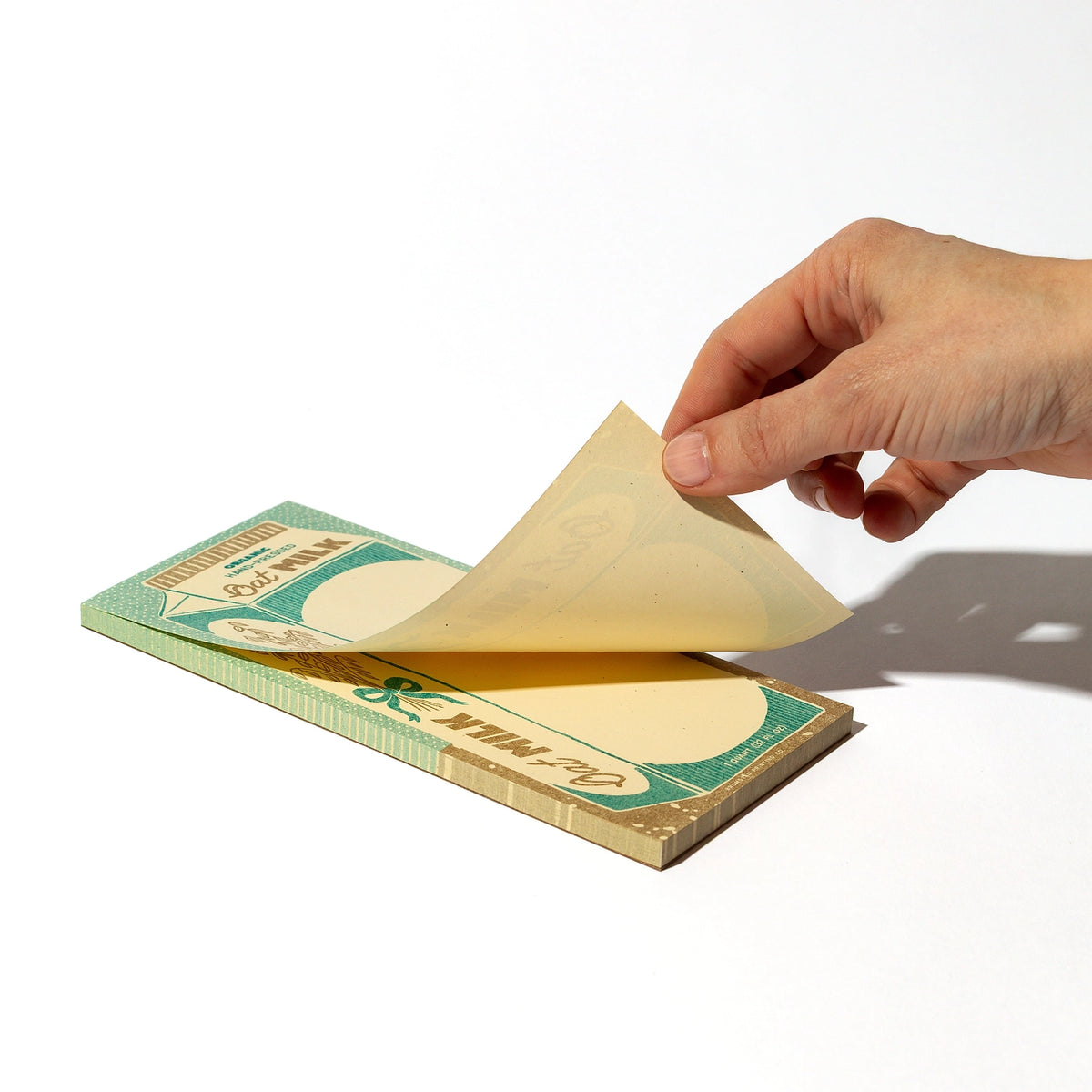 Part of the Quart Collection of charming carton-shaped notepads. Oat milk is for the lactose-intolerant and those looking for plant-based alternatives to dairy. Risograph printed in metallic gold and teal on cream paper.