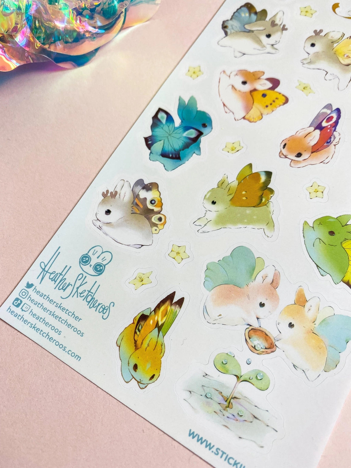 These colorful winged cuties are coming to steal your heart!
🐰🦋 Art by: @heathersketcheroos
One sticker sheet is included.