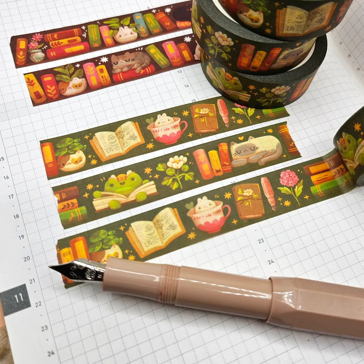 A washi tape inspired by plants and bookish things! This is a reprint of an older design - the colors are a little brighter this time. Each roll of washi tape is 15mm (approximately 0.59 inches) wide and 10 meters (approximately 10.9 yards) long.
Washi tapes have a small labeling sticker with branding and design, but without extra packaging.