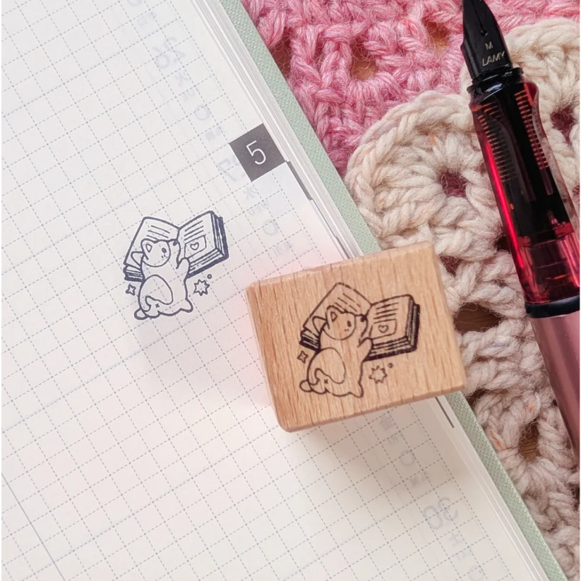 A small wood stamp of a little literary puppy for your planner and scrapbooking needs. Each stamp measures approximately 1 x 0.75 inch.
Stamps come loose and without any extra packaging.