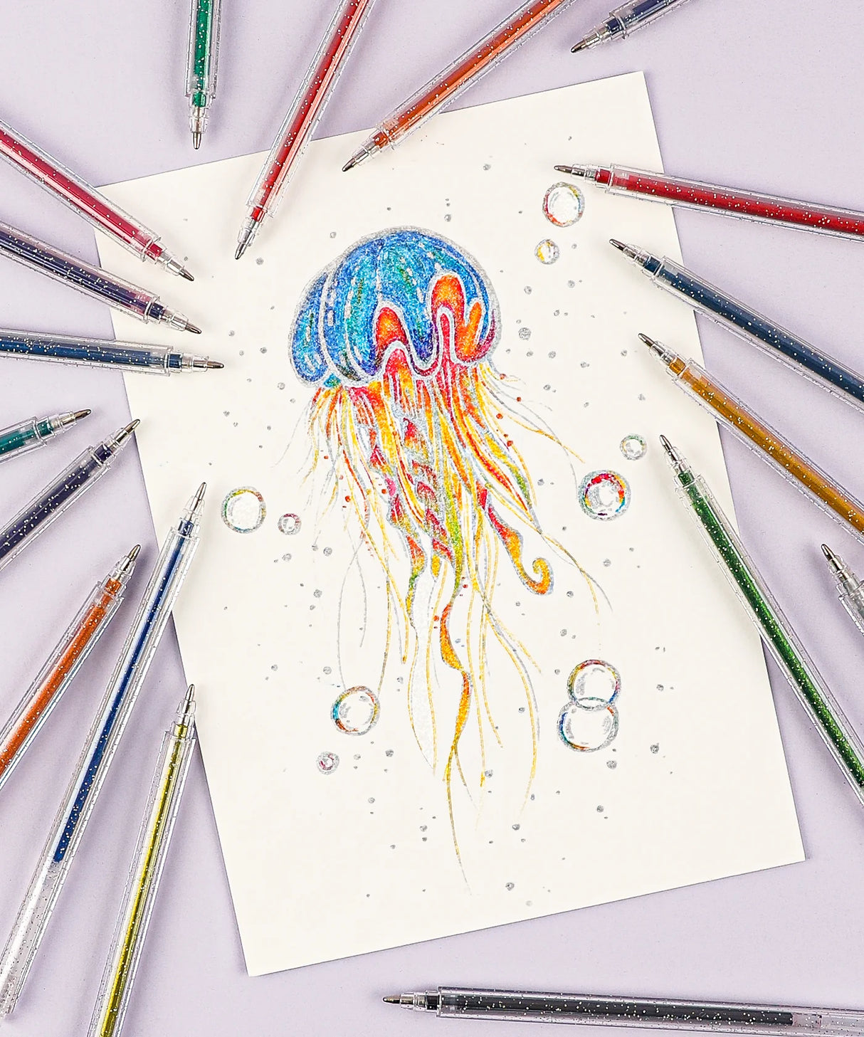 Unleash your creativity and add a touch of sparkle to your artistic endeavors with Grabie Glitter Gel Pens. With a stunning array of 18 vibrant colors packed with shimmering glitter, these pens ignite the imagination with brilliant shades of the rainbow.
COLOR-CHANGING GLITTER INK - The advanced glitter technology shifts hues based on the ink color, showcasing a stunning chameleon effect when exposed to sunlight.