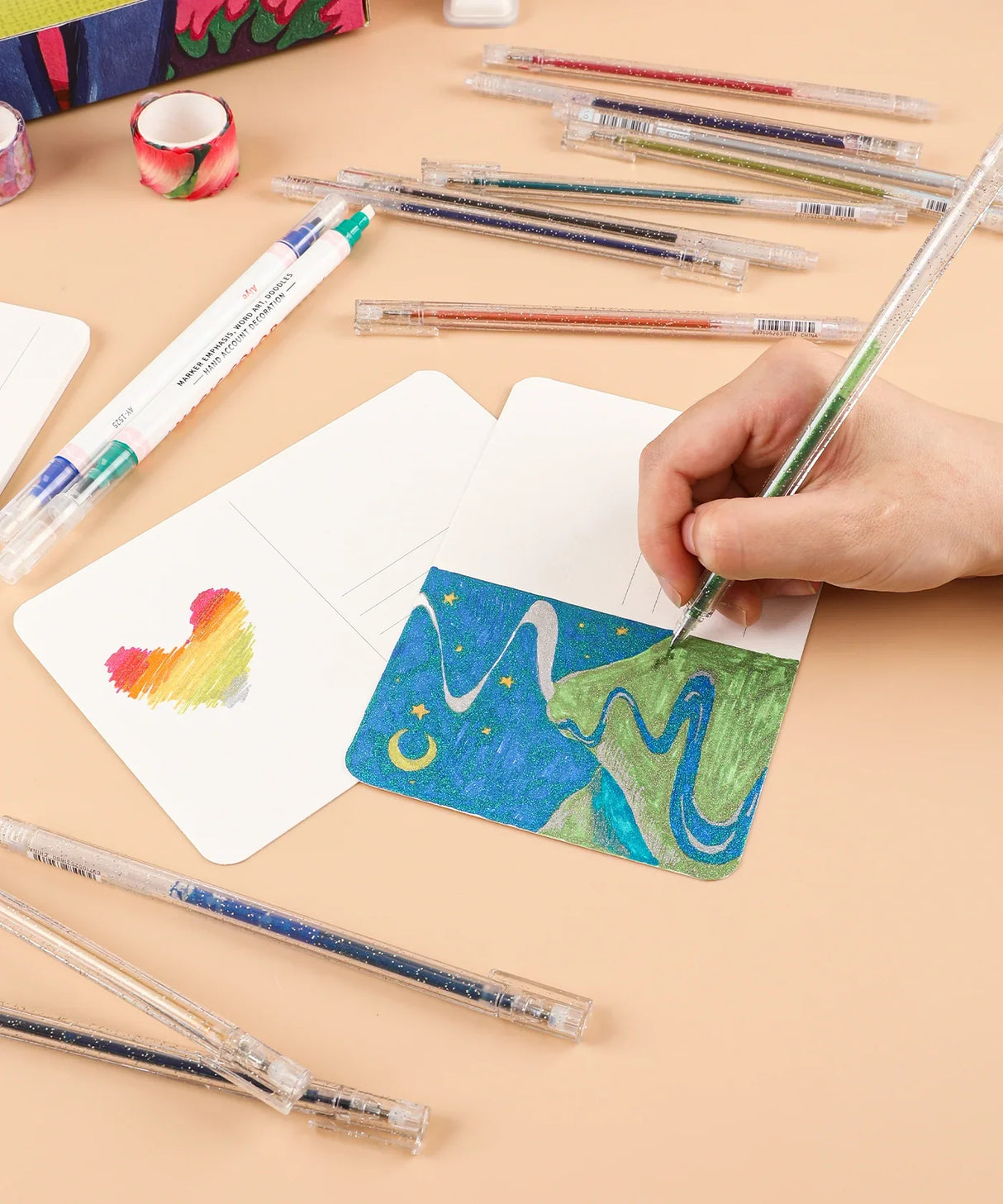 Unleash your creativity and add a touch of sparkle to your artistic endeavors with Grabie Glitter Gel Pens. With a stunning array of 18 vibrant colors packed with shimmering glitter, these pens ignite the imagination with brilliant shades of the rainbow.
COLOR-CHANGING GLITTER INK - The advanced glitter technology shifts hues based on the ink color, showcasing a stunning chameleon effect when exposed to sunlight.