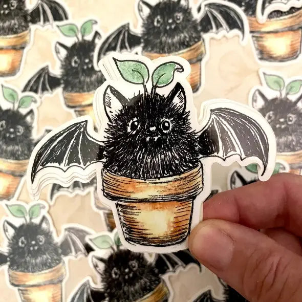 Sprig, a bat that lives in a flower pot!
Includes one 3" vinyl sticker
Dishwasher Safe and Water resistant
Perfect for water bottles, laptops, folders and more!