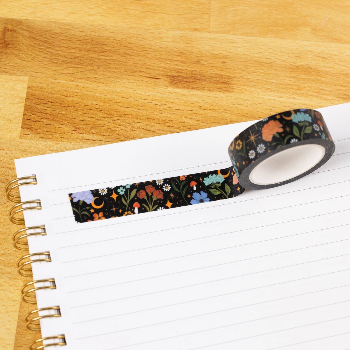 Celestial Garden Washi Tape
Our washi tape is made for paper lovers, pen pals, and anyone who gets butterflies in the stationery aisle. Perfect for journaling, scrapbooking, decorating envelopes, or adding a personal touch to planners and calendars. It's gentle on paper, easy to tear by hand, and removable without leaving residue, so you can rearrange, redo, and re-stick as needed.
Design Features:
Each roll measures 15mm wide on a 10m roll
Full color repeating pattern
Washi tape dispenser packagin