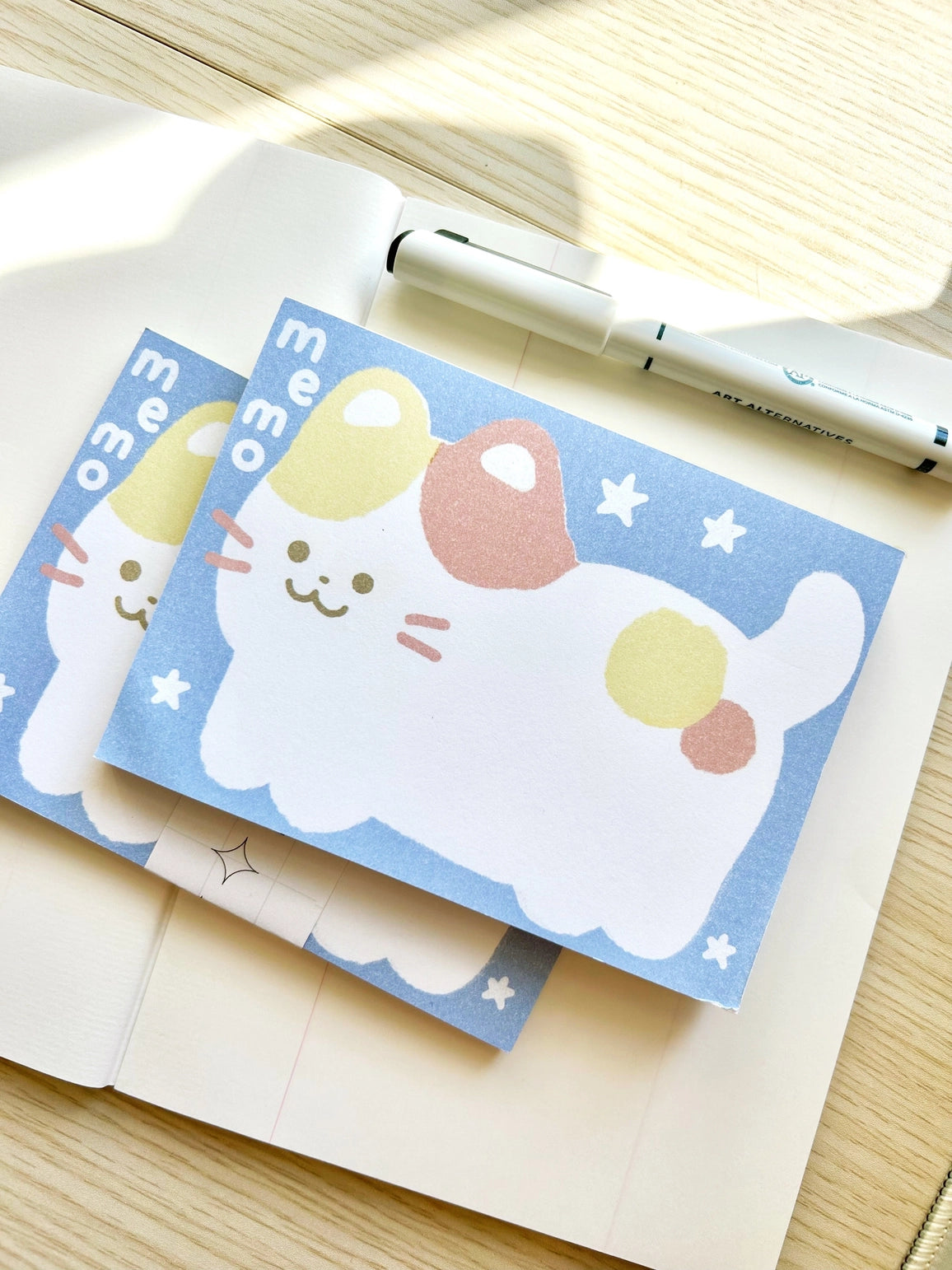 Chocolett - Kitty Memo Pad
This memopad comes with 50 thick pages and measures 5.5 x 4 inches big. It’s cutely decorated with a giant kitty for all your notes and memos.
Please note that these are not sticky notes.
Includes 1 memo pad