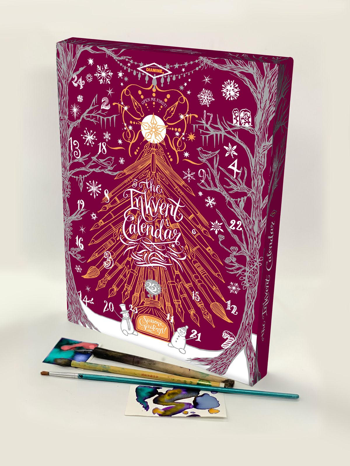 The Diamine InkVent Calendar 2026 is the ultimate treat for fountain pen ink fanatics (or, let’s face it, a well-deserved splurge for yourself!).
Behind each of the 24 doors is an ink bottle, with the first twenty-four days featuring a different 12ml plastic ink bottle, and the final day holding a 30ml plastic ink bottle. The Inkvent has been enhanced this year with swatch cards and a 26th door that will contain a unique collectable.
All the inks are brand new and include: Standard, Sheen, Extreme Sheen,