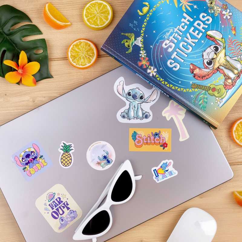More than 500 colorful stickers of everyone’s favorite blue alien are perfect for scrapbooking or decorating your personal items.
Since the 2002 release of the Disney animated film Lilo & Stitch, the wild blue alien known as Stitch has become a fan favorite—so much that he now has his own sticker book! This collection of more than 500 colorful stickers includes fun and rarely seen images from the Disney archives, including character art, composed graphics, icons, and unique designs that are perfect for scr
