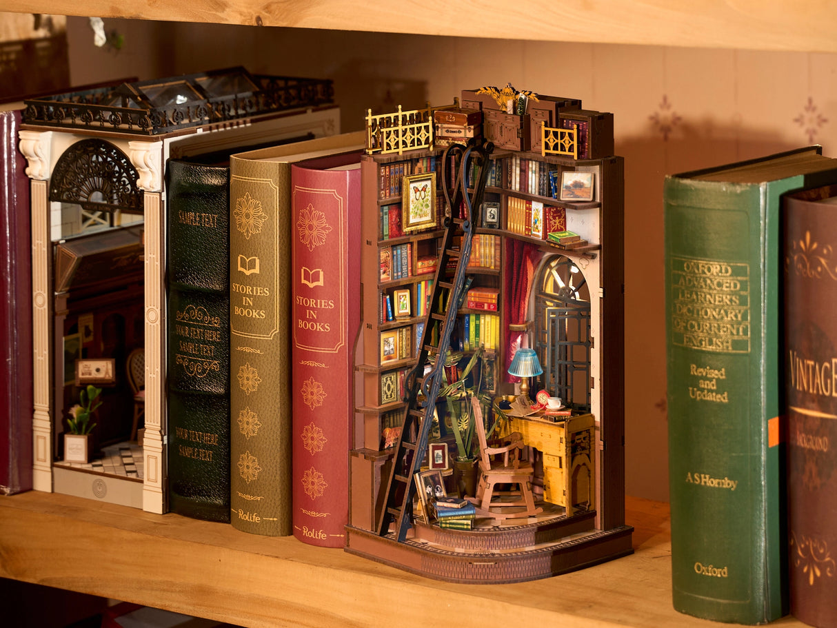 Silent Corner Study is a complete miniature bookshelf insert kit designed for craft enthusiasts and book lovers, featuring pre-cut wooden pieces, vintage-style furniture, bookshelves, and warm LED lighting that creates a cozy reading nook scene. Ideal for retail gift shops, bookstores, and hobby stores, this eye-catching decor item comes in compact, shelf-ready packaging with clear instructions and assembly tools included—making it a thoughtful gift and an engaging DIY project for adults and teens alike.