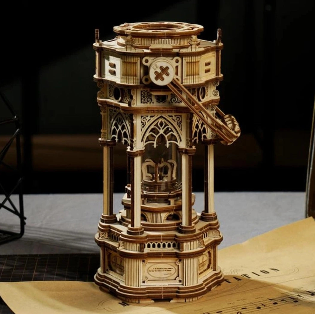 This ornate lantern DIY music box lights up as well as plays to the melody of "YOU LIGHT UP MY LIFE" after being wound up.
• Music box tune: YOU LIGHT UP MY LIFE
• Assembled size: 140 x 115 x 300mm.
• Pieces: 210 pcs.
• Age range: > 14 years old