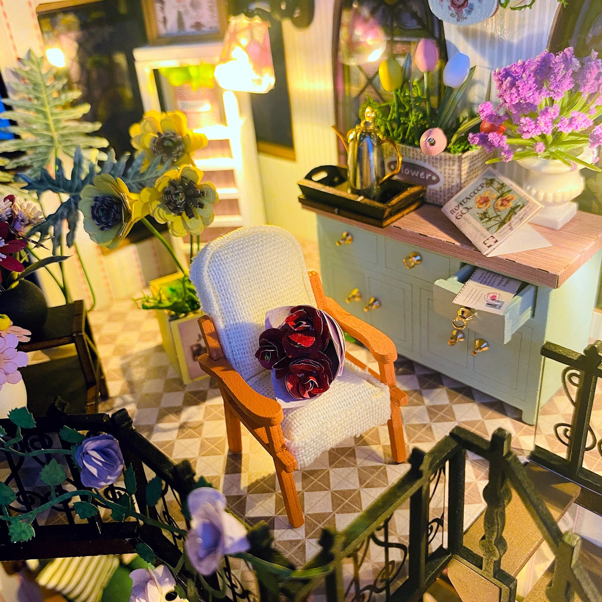 Escape into a peaceful retreat with this miniature kit-a dreamy blend of indoor charm and outdoor beauty. This cozy loft is a plant lover's paradise, filled with blooming flowers, lush greenery, and thoughtful touches of home. With a comfy sofa, a charming desk, and warm light that illuminates the space, it's the perfect hideaway for creativity and relaxation.
2 AAA batteries required; batteries are not included.
Age Range: 14+
Assembled Dimensions: 8.7 x 6.7 x 9.25 inches