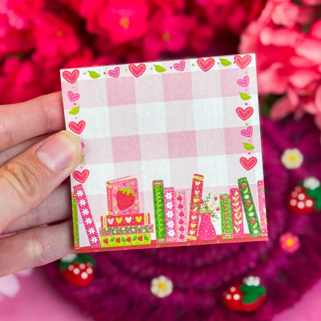 Stay organized in style with this adorable Strawberry Bookshelf Notepad! Perfect for jotting down your daily tasks, goals, and bookish ideas, this notepads brings a pop of personality to your desk. Featuring a sturdy cardboard back and premium 70lb. uncoated paper, it's built to last through all your planning adventures.
✦ DETAILS ✦
Size: 3" x 3"
70 lb. Paper Uncoated
Padded With Cardboard Back
50 Sheets
No magnet backing