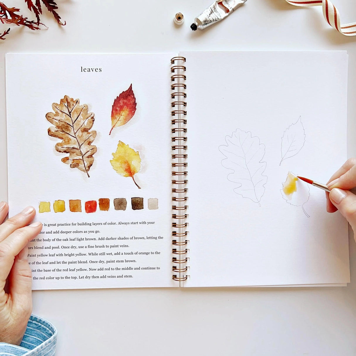 Twelve autumn illustrations — a pumpkin, squirrel, fall leaves, vintage truck, mum bouquet, fall wreath, and more — each pre-outlined with step-by-step instructions. Paintings take about thirty minutes from start to finish, making it approachable for first-time painters and a favorite for gifting.
12 beginner-friendly illustrations
Thick 120lb watercolor paper
Lay-flat pages with spiral binding for hassle-free painting and easy tear-out
Lightly outlined sketches to guide you
Easy to carry