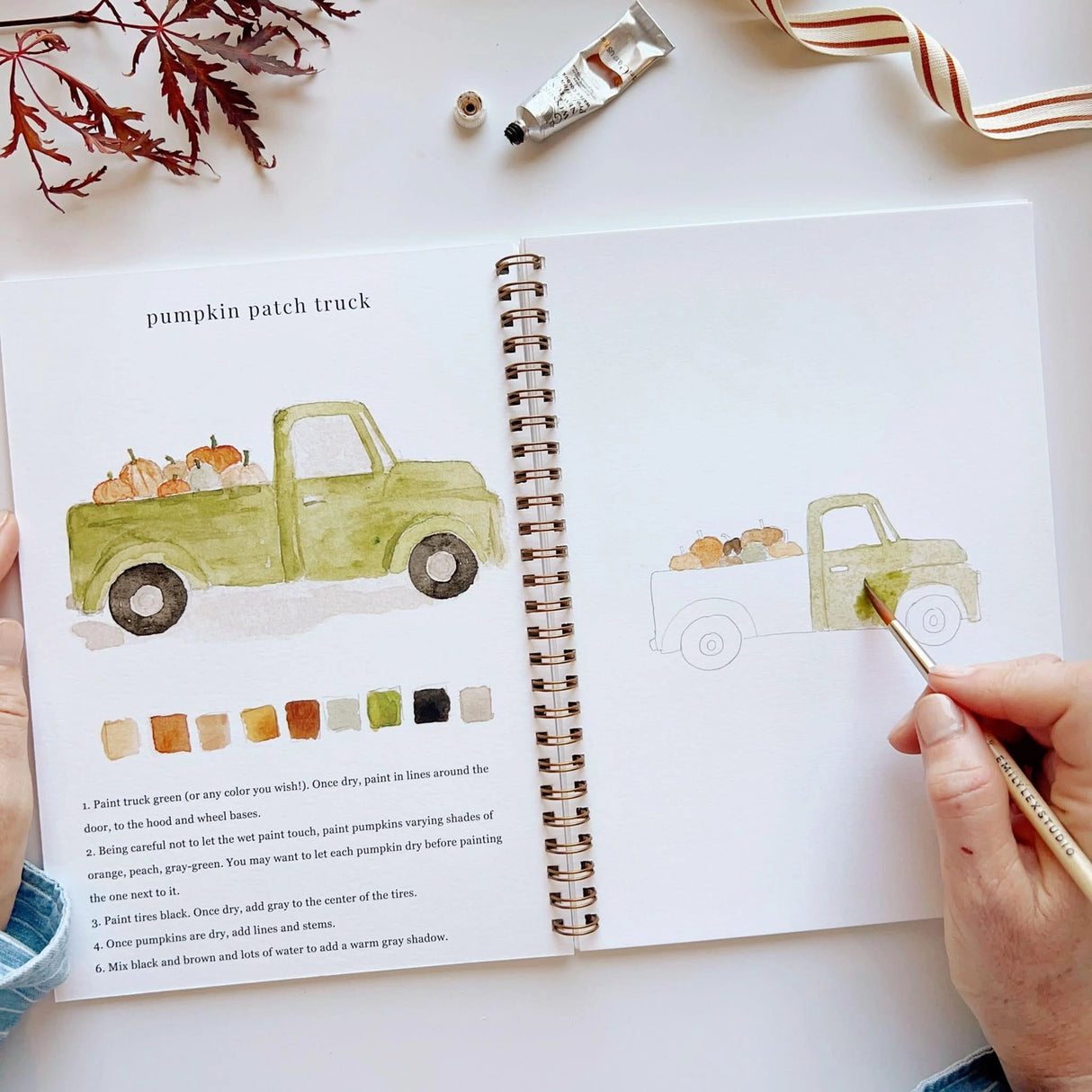 Twelve autumn illustrations — a pumpkin, squirrel, fall leaves, vintage truck, mum bouquet, fall wreath, and more — each pre-outlined with step-by-step instructions. Paintings take about thirty minutes from start to finish, making it approachable for first-time painters and a favorite for gifting.
12 beginner-friendly illustrations
Thick 120lb watercolor paper
Lay-flat pages with spiral binding for hassle-free painting and easy tear-out
Lightly outlined sketches to guide you
Easy to carry