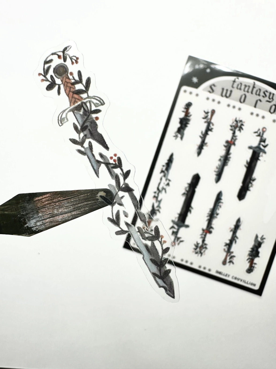 The Fantasy Swords sticker sheet has illustrations by Shelley Couvillion. I paint everything myself in goache! No AI here. This set pairs perfectly with the Swords washi tape as it uses the same illustrations! Perfect for journaling, especially for those of us with a gothy or fantasy or dark academia aesthetic.