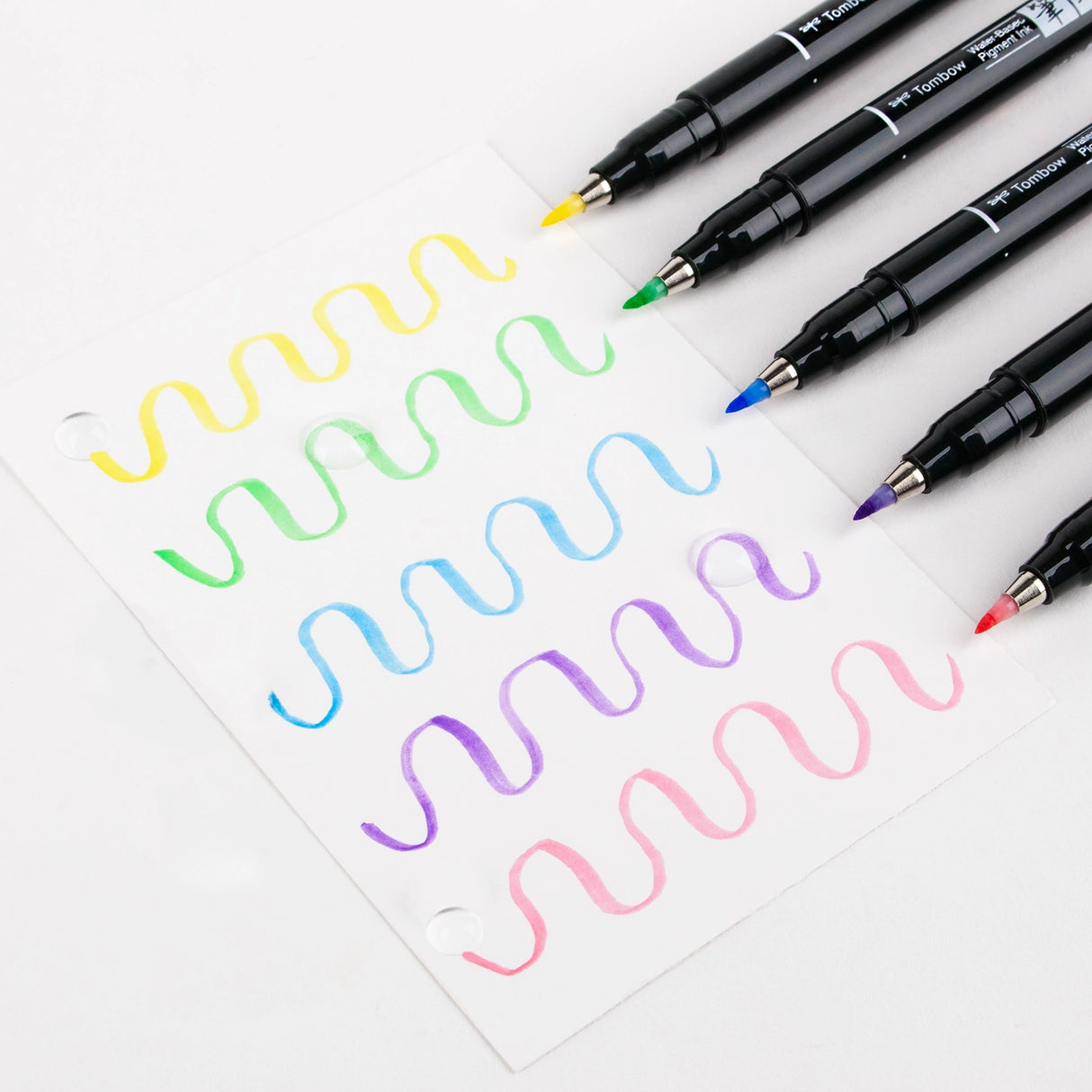 The first Fudenosuke Brush Pen that writes on dark paper!
Soft, flexible brush tip creates thick and thin lines by changing pen pressure. Water-based pigment ink appears as brilliant pastel colors on white paper and chalky pastels on dark paper. When using on dark paper, ink initially appears transparent and color intensifies as it dries.
For optimal opacity on dark paper, apply 2-3 layers to intensify saturation. The water-resistant ink won’t bleed through most papers.
Great for beginner brush calligrap