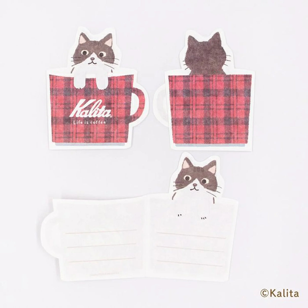 Inspired by the corporate philosophy of Kalita, a leading coffee equipment manufacturer— "A slightly better time, a perfectly timed moment"—
we’ve created the second edition of our original stationery to enjoy with your coffee.
This collection is designed to be enjoyed alongside your coffee moments. The cat's paw features a cutout, allowing it to be used as a seal-perfect for adding a sweet touch to a letter when giving a gift.
6 sheets of letter paper
Material: Japanese Paper