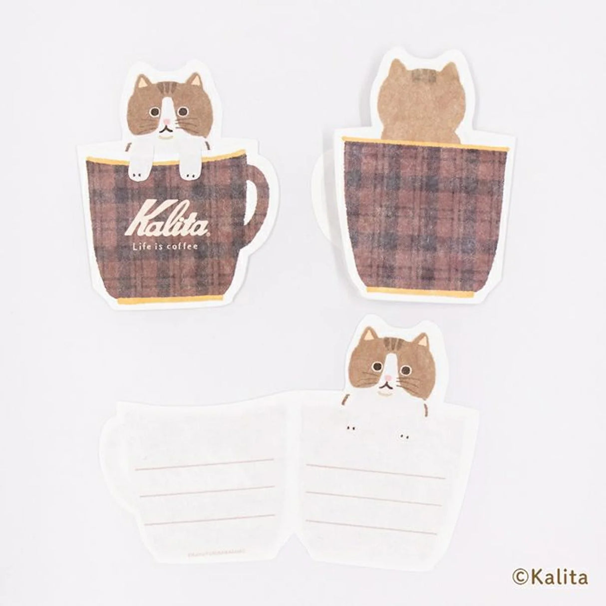 Inspired by the corporate philosophy of Kalita, a leading coffee equipment manufacturer— "A slightly better time, a perfectly timed moment"—
we’ve created the second edition of our original stationery to enjoy with your coffee.
This collection is designed to be enjoyed alongside your coffee moments. The cat's paw features a cutout, allowing it to be used as a seal-perfect for adding a sweet touch to a letter when giving a gift.
6 sheets of letter paper
Material: Japanese Paper