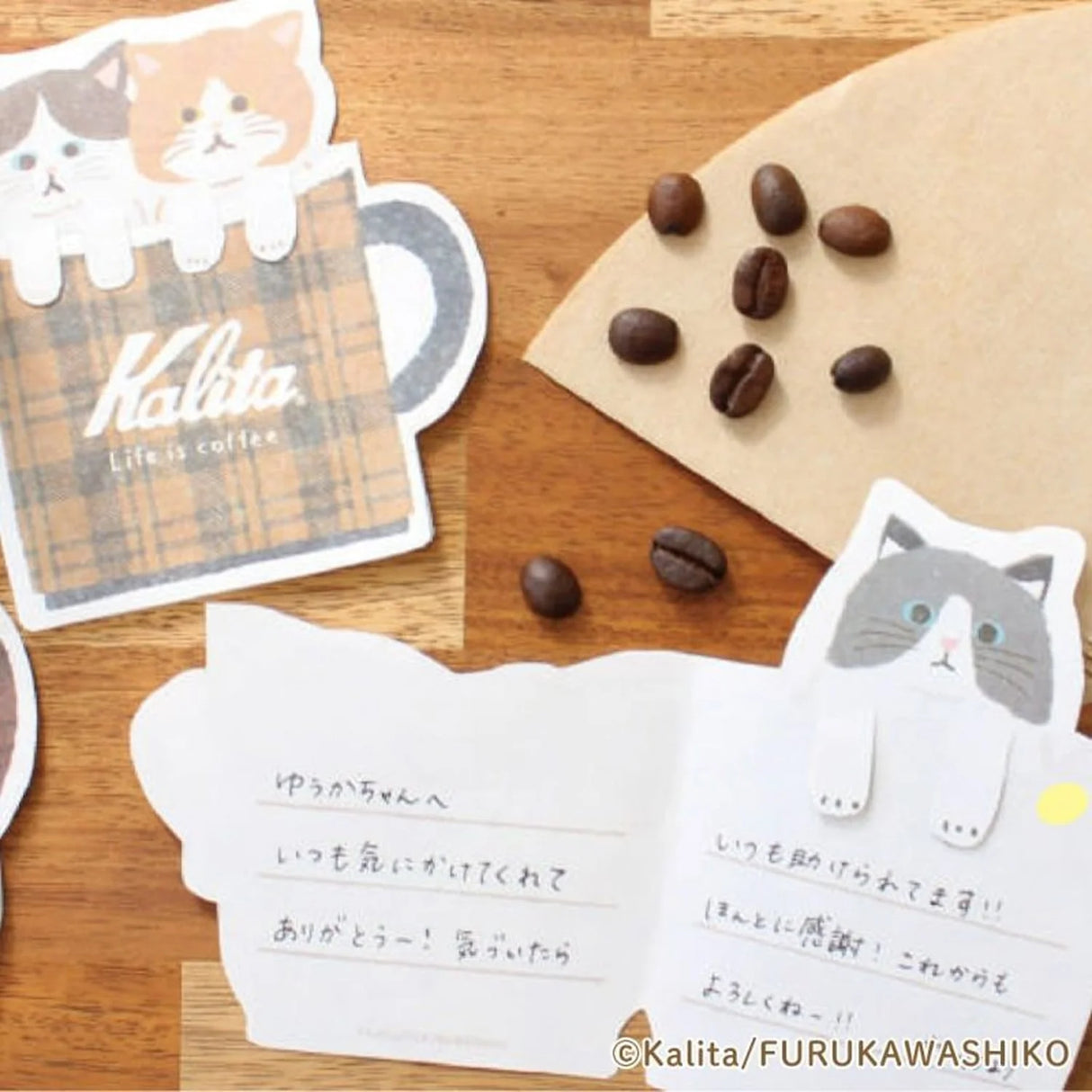 Inspired by the corporate philosophy of Kalita, a leading coffee equipment manufacturer— "A slightly better time, a perfectly timed moment"—
we’ve created the second edition of our original stationery to enjoy with your coffee.
This collection is designed to be enjoyed alongside your coffee moments. The cat's paw features a cutout, allowing it to be used as a seal-perfect for adding a sweet touch to a letter when giving a gift.
6 sheets of letter paper
Material: Japanese Paper