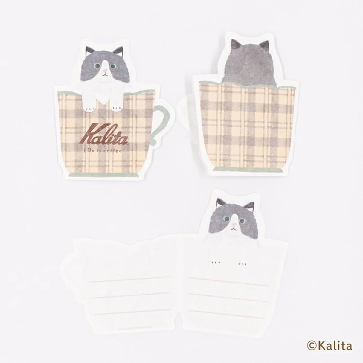 Inspired by the corporate philosophy of Kalita, a leading coffee equipment manufacturer— "A slightly better time, a perfectly timed moment"—
we’ve created the second edition of our original stationery to enjoy with your coffee.
This collection is designed to be enjoyed alongside your coffee moments. The cat's paw features a cutout, allowing it to be used as a seal-perfect for adding a sweet touch to a letter when giving a gift.
6 sheets of letter paper
Material: Japanese Paper