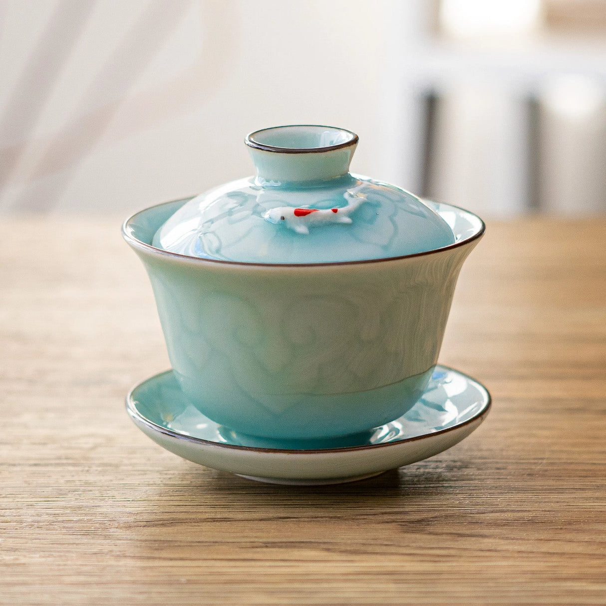 This classic gaiwan teapot is the perfect brewing vessel for many styles of premium teas such as oolong and pu'er
Size: 2" H x 3.25" W x 3.75"D
Capacity: 5oz (150ml)
Material: Porcelain
Origin: China