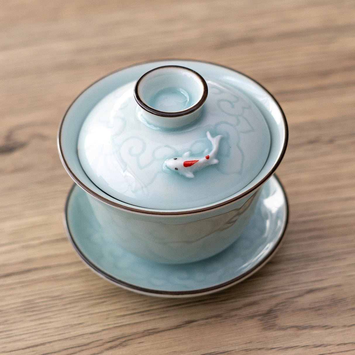 This classic gaiwan teapot is the perfect brewing vessel for many styles of premium teas such as oolong and pu'er
Size: 2" H x 3.25" W x 3.75"D
Capacity: 5oz (150ml)
Material: Porcelain
Origin: China